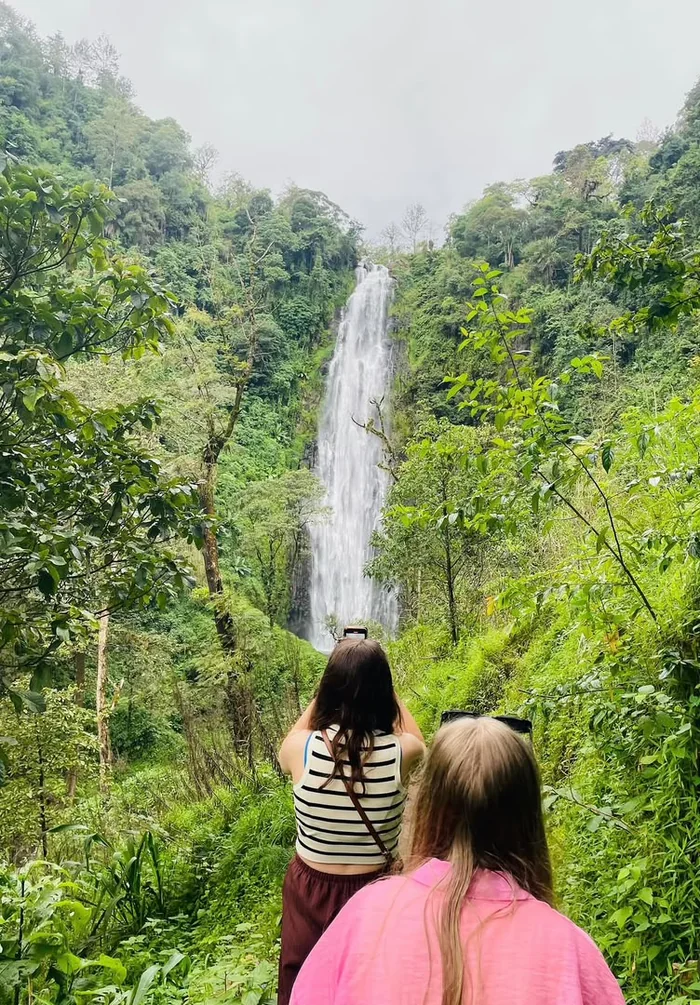 Guests admiring Materuni waterfall