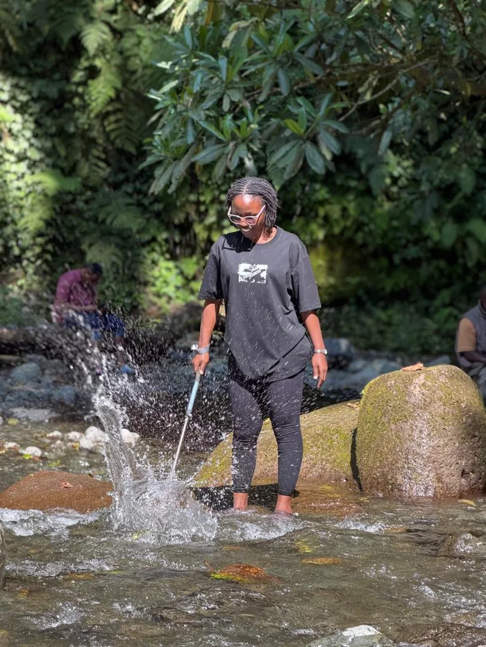 Local guide playing in the water at Napuru