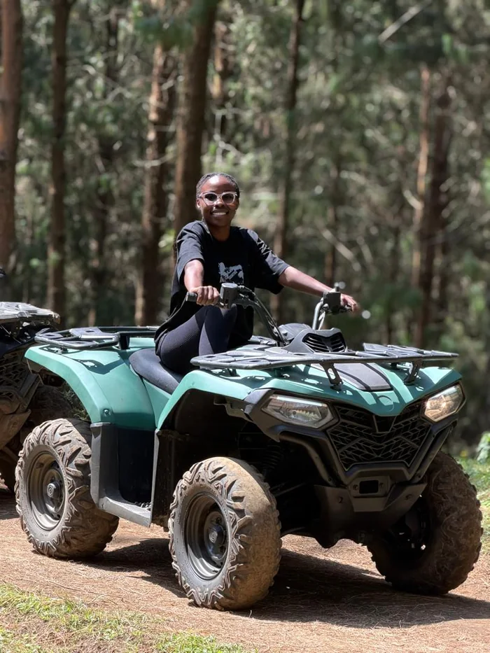 Guests on a quad bike ride through the forest