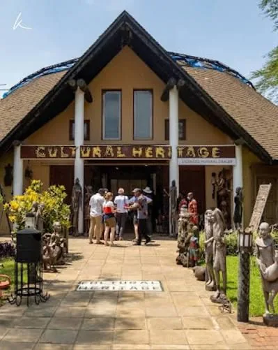 Cultural Heritage Centre entrance sign with visitors