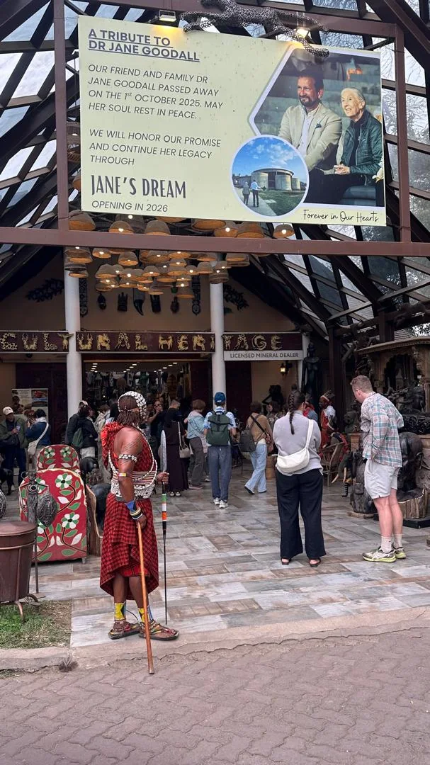 Cultural Heritage Centre entrance with a Maasai warrior in traditional dress