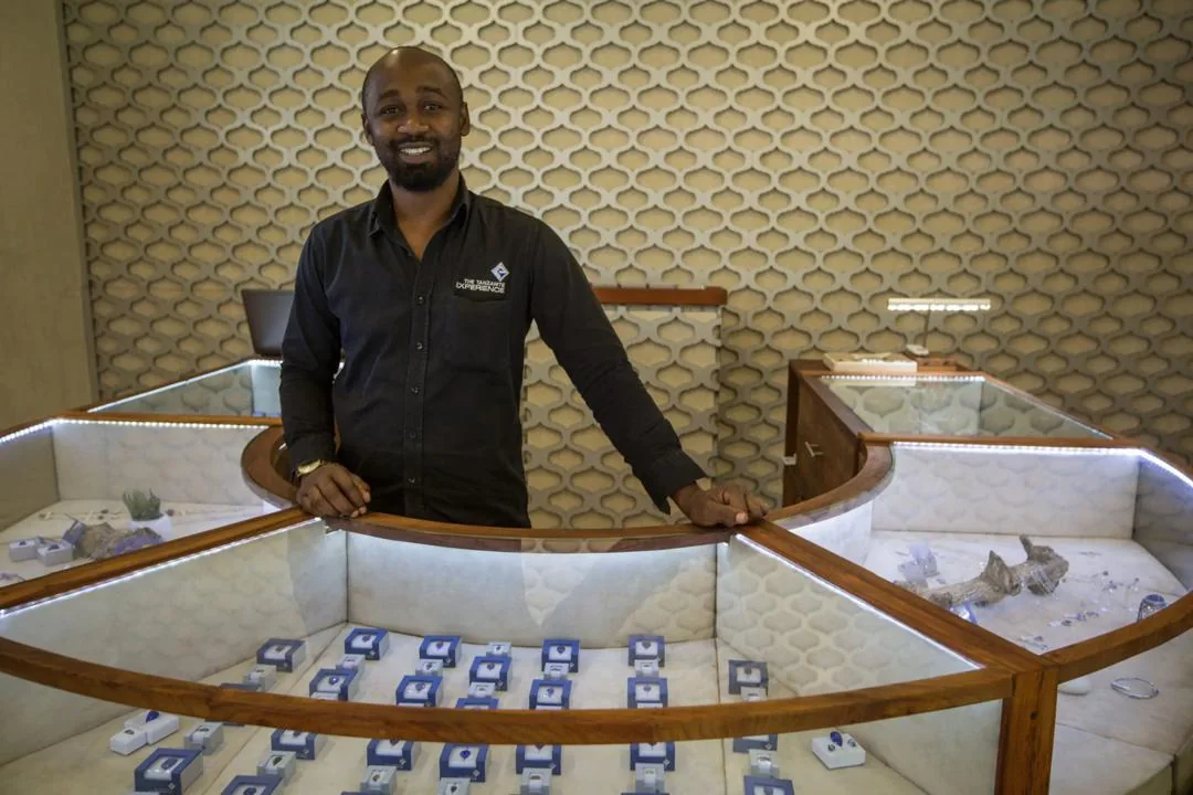The Tanzanite Experience reception and jewelry display cases