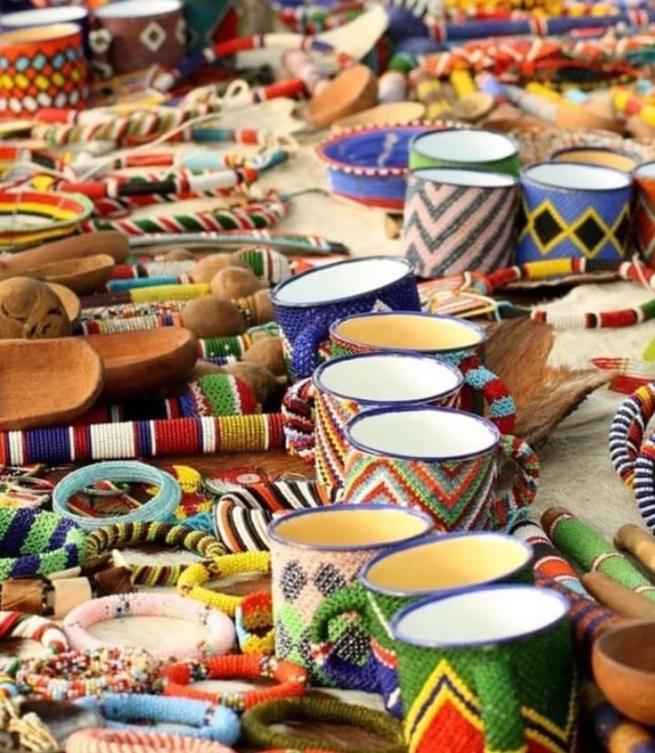 Beaded earrings and bracelets on display
